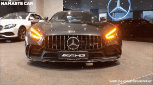 the mercedes amg sports car is displayed in a showroom