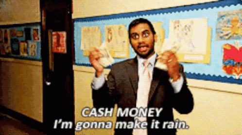 a man in a suit with money in his hands