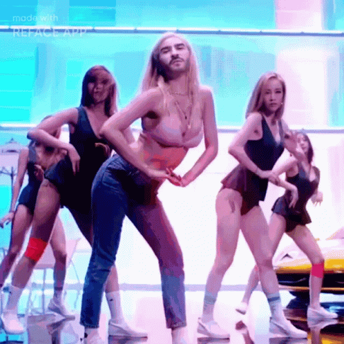 a group of women dancing on top of dance floors
