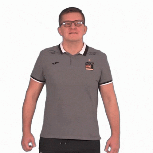 a man with glasses wearing a polo shirt