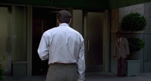 man standing in the doorway of a building