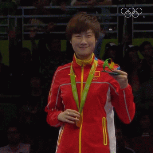 the  is happy to see his gold medal