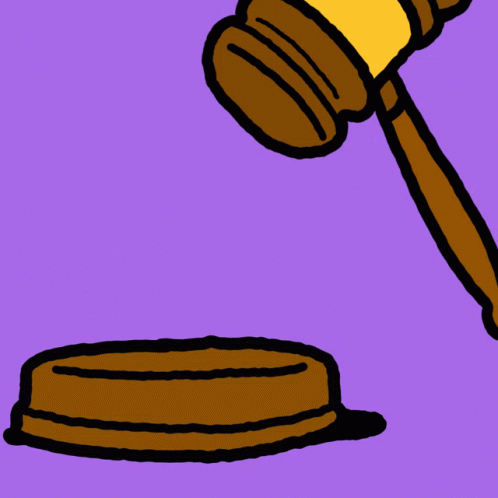 a blue judge's hammer is hitting a pink object