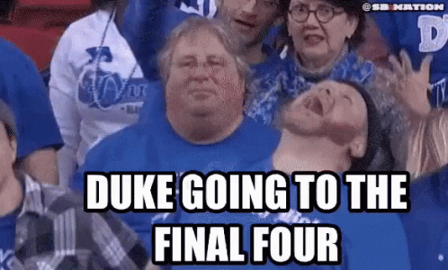 a crowd is holding up the words duke going to the final four