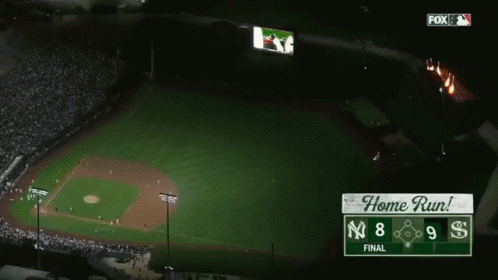 an aerial view of a baseball field at night