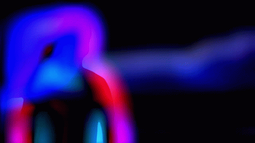 blurred motion blur pograph of an abstract shape with color in the middle