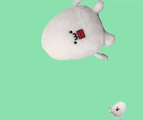 an animated white stuffed toy with ons and legs
