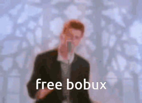 a man in black suit and blue tie with free bobux on background