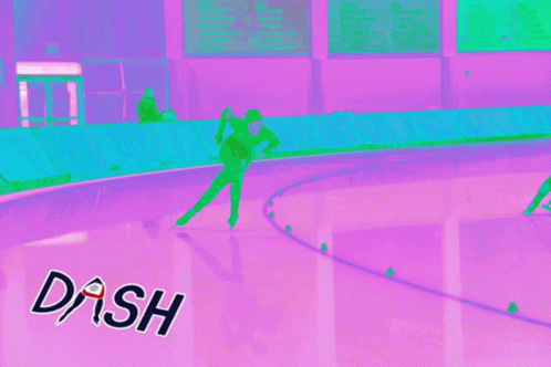 two people are playing with frisbee on an indoor court