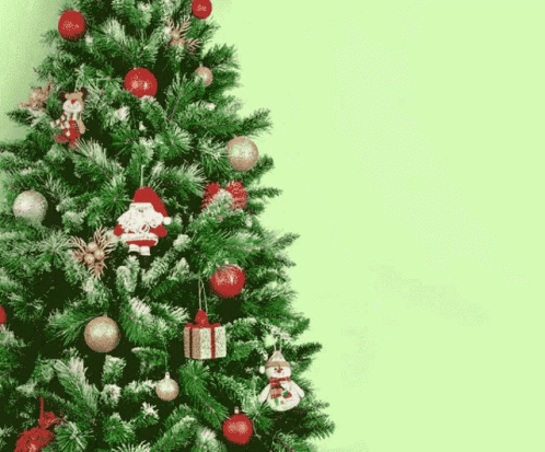 a blue and white christmas tree on green