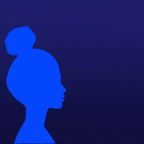 a man's head with the shadow of a woman's profile