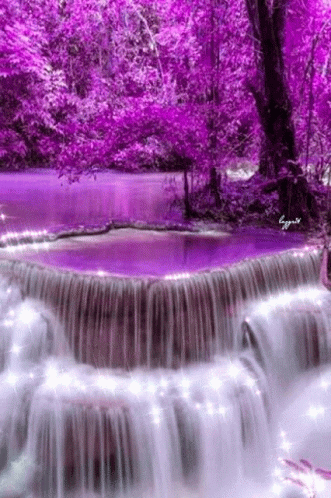 a purple waterfall filled with water surrounded by trees