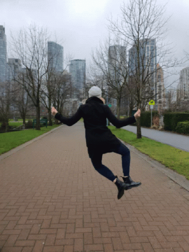 a man in mid air performing tricks on his skateboard
