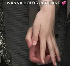 hand with one foot on a desk with the caption i wanna hold your hand