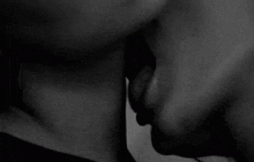 two people that are kissing together with one another