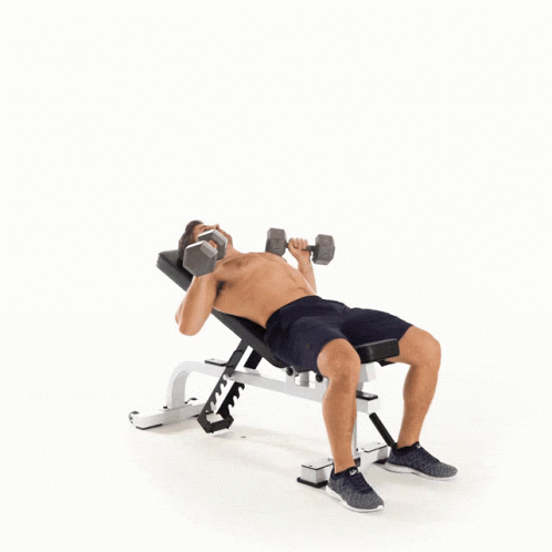 a man doing incline press with one arm
