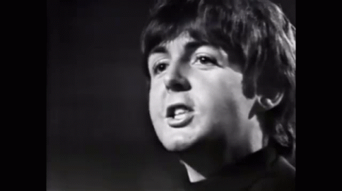 the beatles singer is shown in black and white