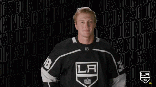 a black and white picture of an los angeles kings hockey player