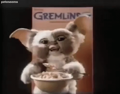 a po of a picture of a gremlin eating cereal