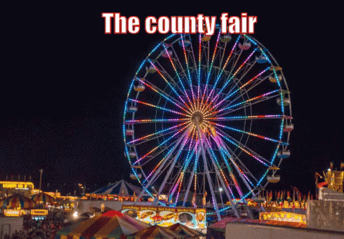 a carnival ride at night with the words the county fair