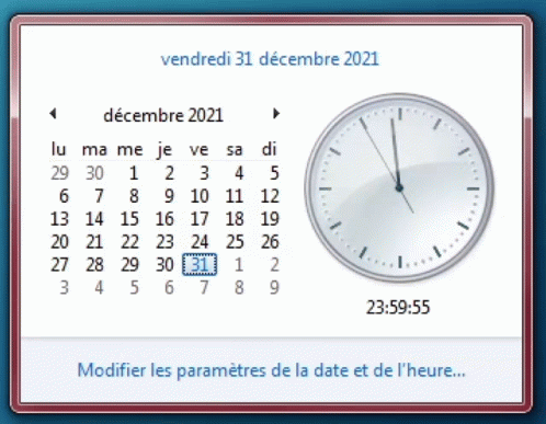 a white screen with a clock in french