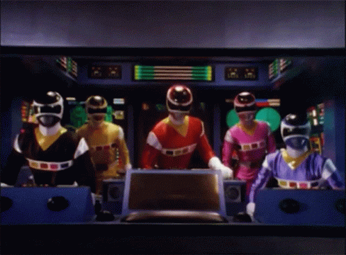 a tv with five people wearing helmets next to each other