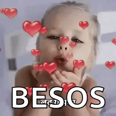 a woman with purple hearts surrounding her and the words beso