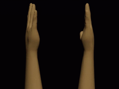 hands reaching toward each other in the dark