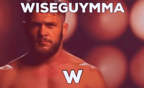 a wrestling player has the words wise guymma over his body