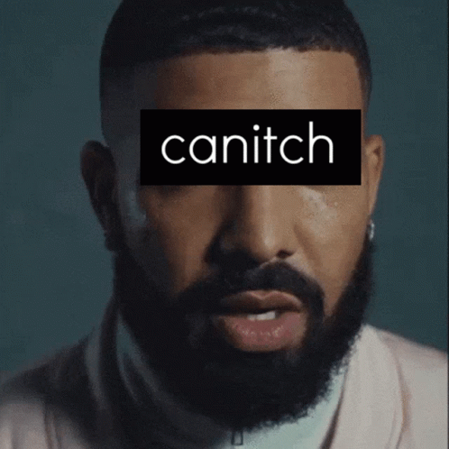 a man with blue hair and a beard that is saying cantich