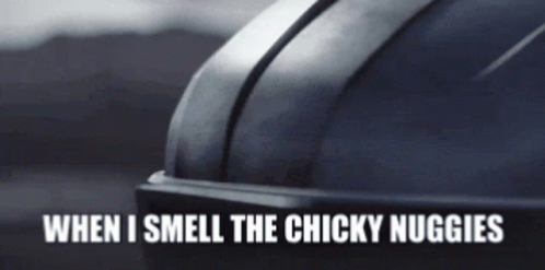 the words when i smell the chucky nuggies over a po of a big bell