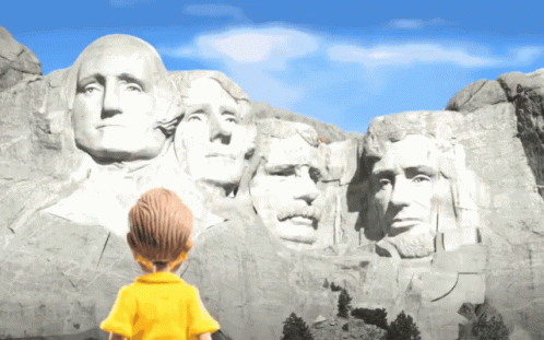 a little  standing near the mountain with many presidents