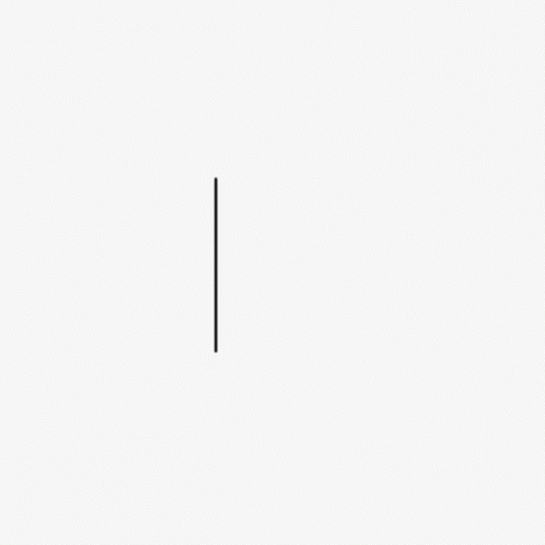 a black and white po of a pole in a field
