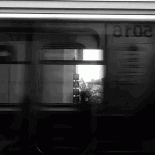 the window of a train as it travels by