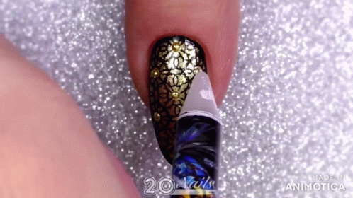 the nail art design is done with acrylics