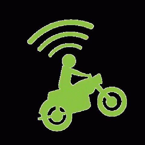 green and black image of a person riding on a motorbike