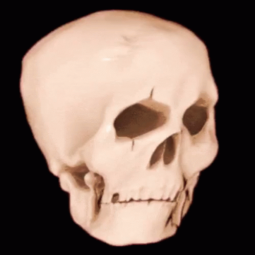 a very weird looking white skull with blue eyes