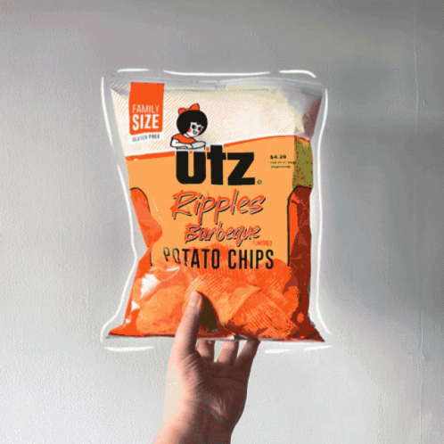 a bag of ultra potato chips being held up