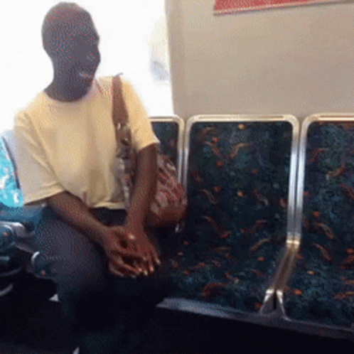there is a man that is sitting on the bus