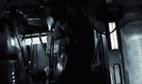 a black and white po of people inside of a train