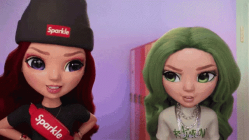 two dolls with hats, one wearing a black and the other green