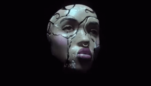 an abstract head with a broken face on the black background