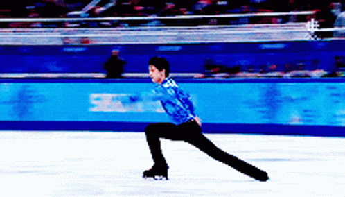an adult skating on ice during a skate event