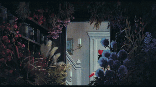 a plant filled doorway to a room full of purple flowers