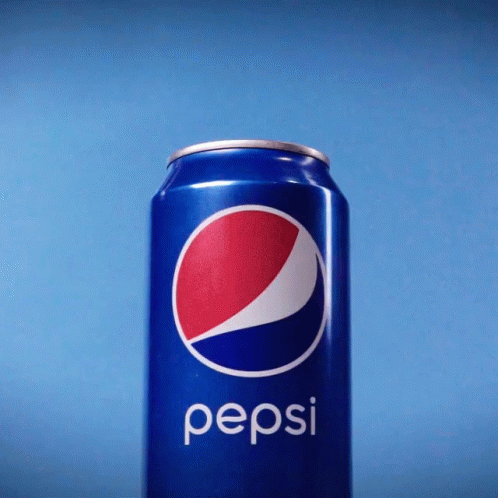 a pepsi can sitting on a table with the caption pepsi