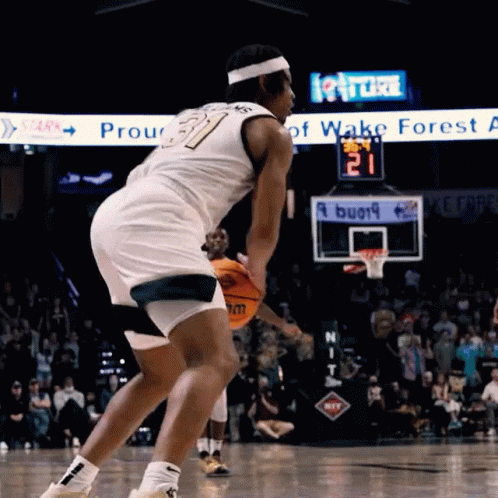 an action s of a person with a basketball