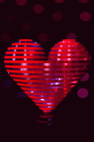 a blue shiny heart surrounded by a group of smaller dots