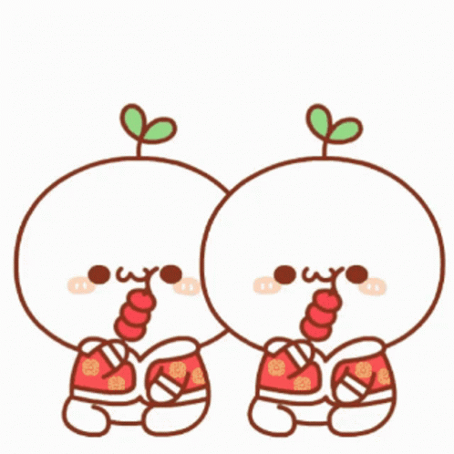 two apples in cartoon style with green leaves