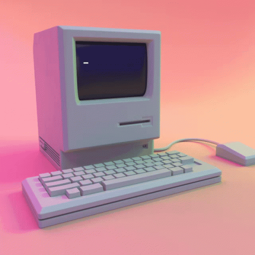 an old computer with a mouse and keyboard