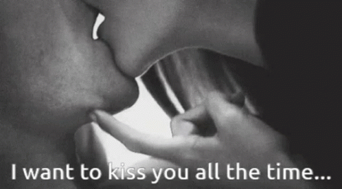 a kissing couple with the words i want to kiss you all the time